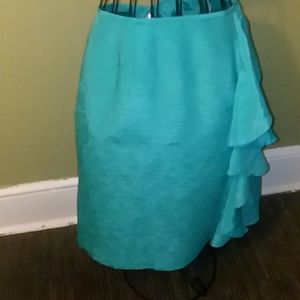 A turquoise skirt